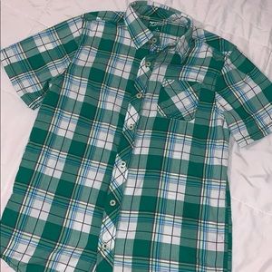 Boy’s green plaid shirt